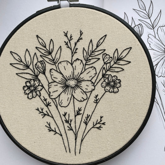 Hand embroidered cosmos design in a 6-inch hoop, from the October birth flower embroidery pattern PDF
